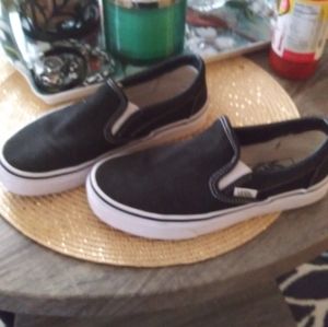 Vans....Size 4 boys....Can fit woman size 6